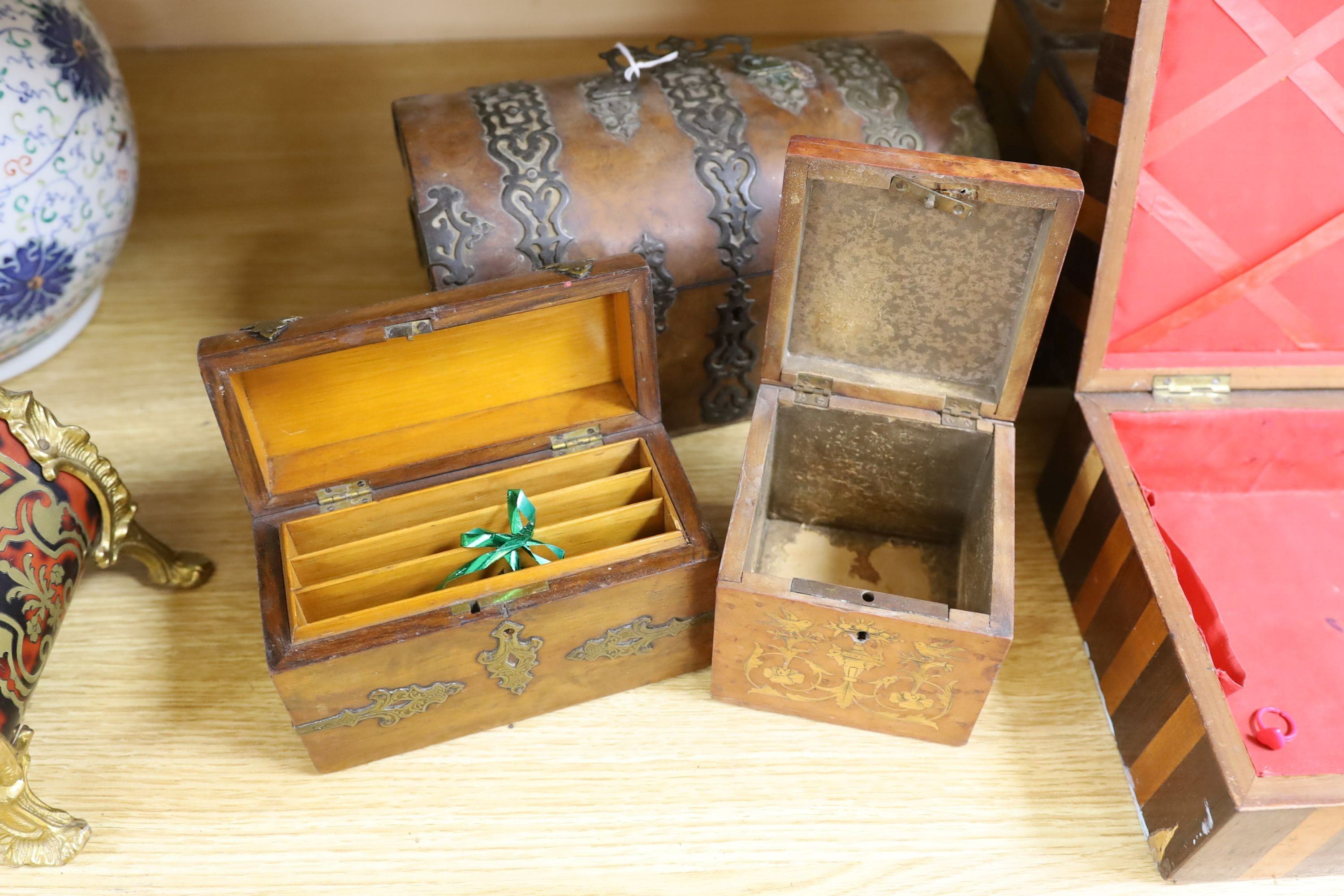 A Victorian Walnut and brass strap mounted tea caddy together with two caskets and five other boxes (8)